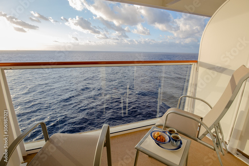 Coffee and pastries on cruise ship balcony early morning