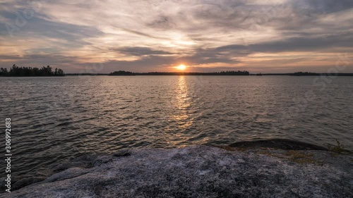 A sunset time lapse taken from a small rocky island on Eagle Lake located in Northwest Ontario, Canada.