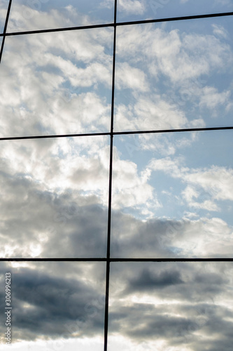 Wallpaper Mural Glass wall of business center with sky reflection. modern building with large mirror window Torontodigital.ca