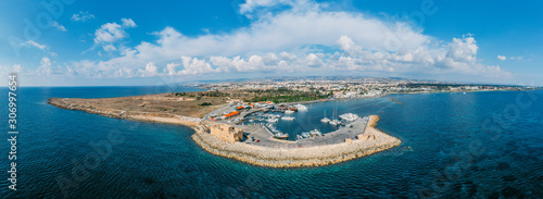 Aerial panorama of Paphos castle from drone in Cyprus. Medieval port castle in harbour on Mediterranean coast. photo