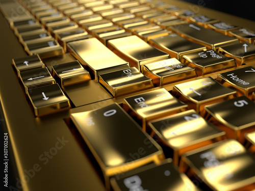 Close-up on a golden keyboard with black background, with depth of field