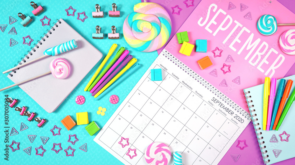 On-trend 2020 calendar page for the month of September modern flat lay with seasonal food, candy and colorful decorations in popular pastel colors. One of a series for 12 months of the year. On-trend 2020 calendar page for the month of September modern flat lay with seasonal food, candy and colorful decorations in popular pastel colors. One of a series for 12 months of the year.