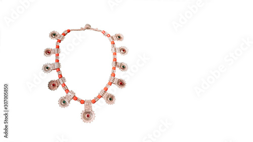 Arabic silver necklace with gemstones isolated on white background.