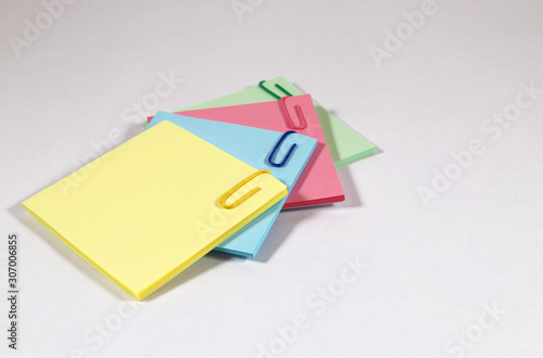 Colored paper clips on color block