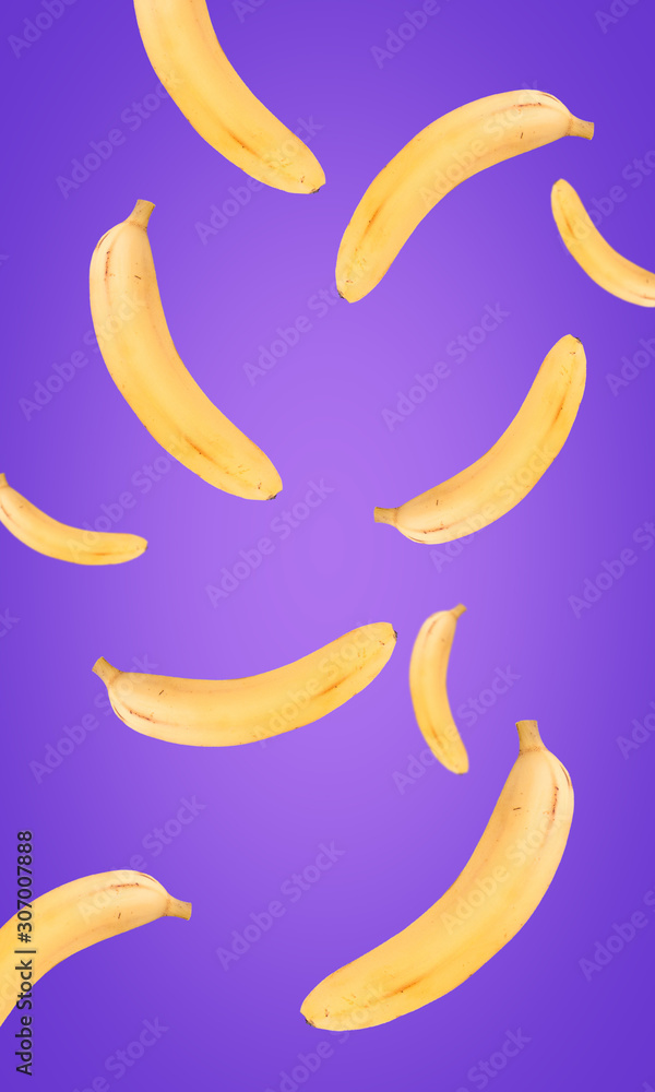 Flying bananas on purple background, vertical banner