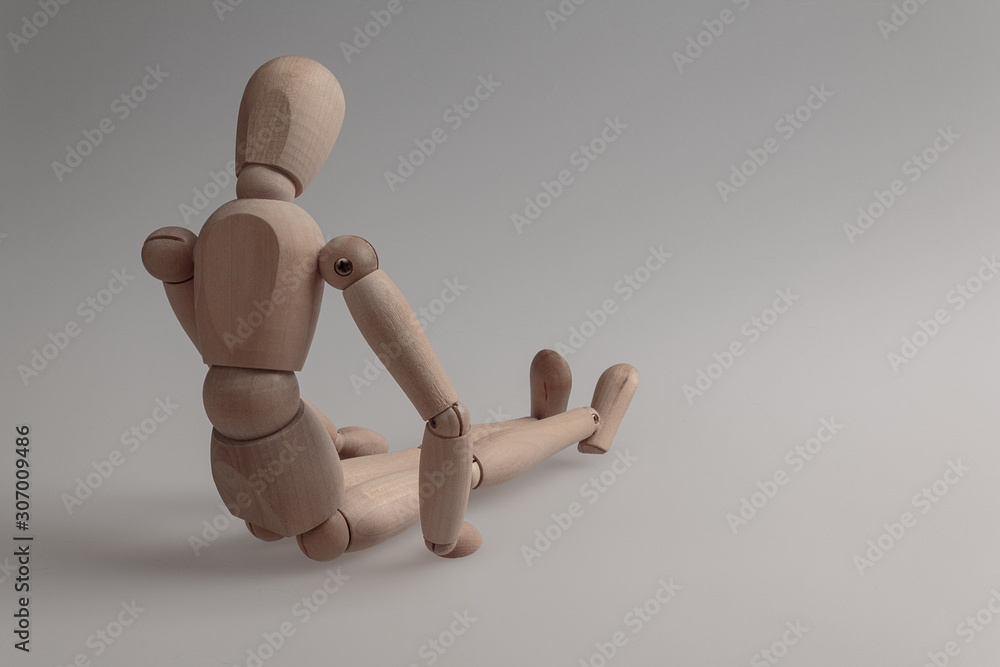 human figurine depicting a lonely bored person, the concept of abandonment and uselessness, despair and depression, autism, mental disorders human figurine depicting a lonely bored person, the concept of abandonment and uselessness, despair and depression, autism, mental disorders