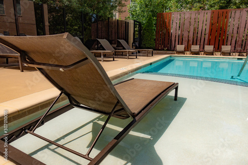 Outdoor Chaise Lounger next to the pool.