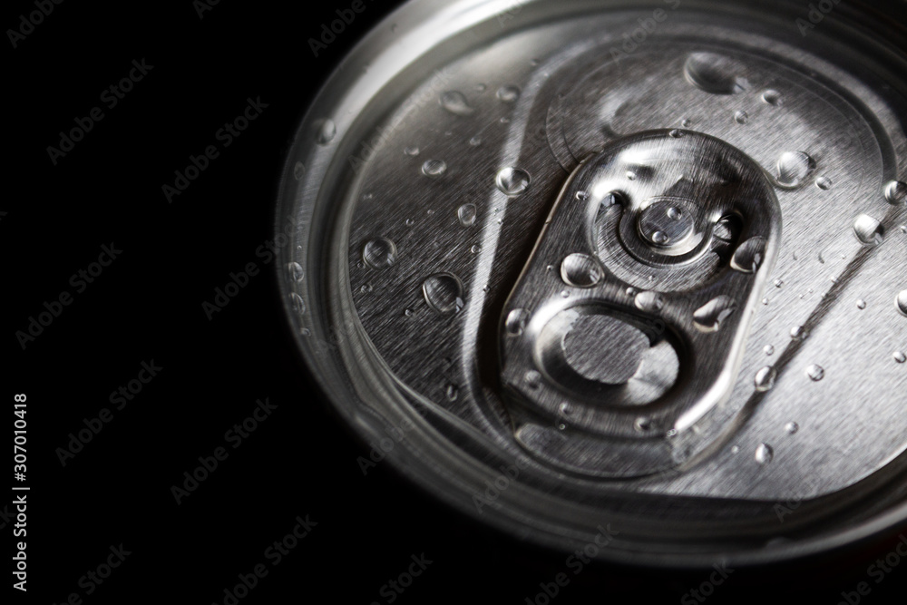 aluminum soda and beer beverage can with water droplets isolated on dark background, metal can, recyclable product aluminum soda and beer beverage can with water droplets isolated on dark background, metal can, recyclable product