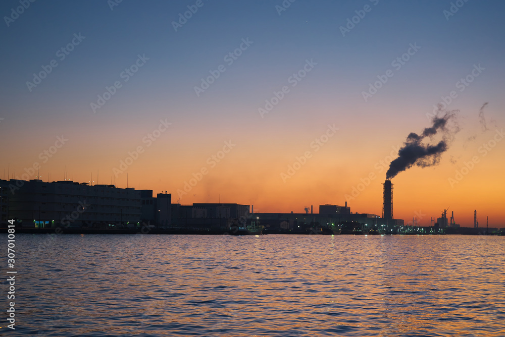 Tokyo,Japan-December 1, 2019: Night view of factories along Tanabe canal in Kawasaki just after the sunset  