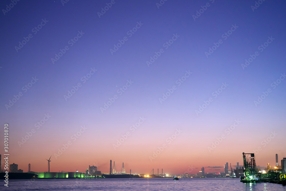 Kanagawa,Japan-December 1, 2019: Night scene of Yokohama port area viewed from a canal near Higashiogijima after the sunset