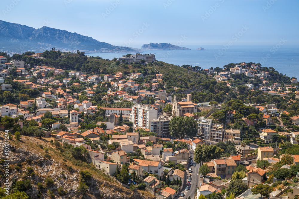 Marseille, France. Aerial panoramic view of the city, the bay and islands from the top of the hill in a summer sunny day. Holidays in France.