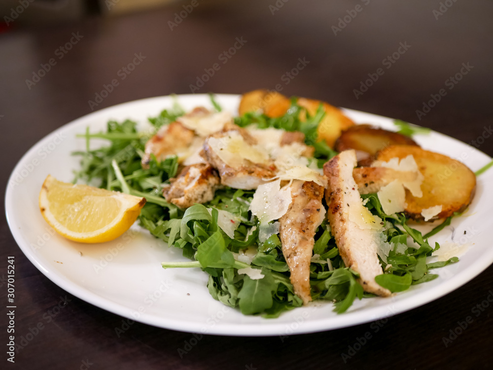 Chicken dish on a restaurant table Chicken dish on a restaurant table