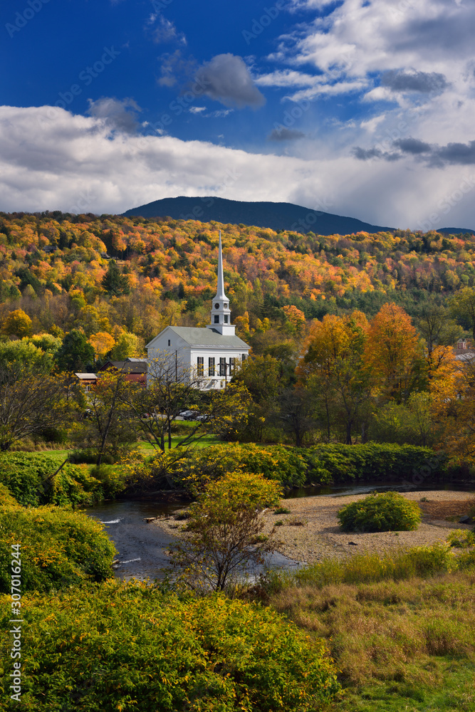 Stowe Community Church with Brush Hill in sunshine with Fall colors Vermont Stowe Community Church with Brush Hill in sunshine with Fall colors Vermont