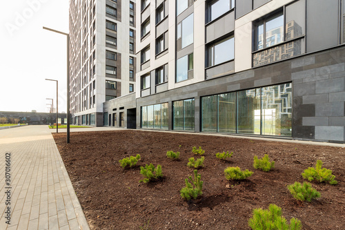 Panoramic window of modern residential building view outside. Insulating glass (glazing, pane). Storm windows. Ground floor apartment. first for shops, offices. commercial premises. Rainscreen. Door photo