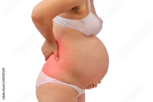 Pregnant woman holding his back in pain