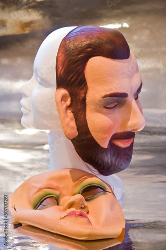 White mannequin head and masks