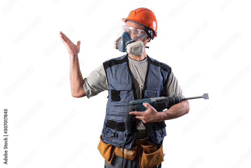The builder with the drill perforator, in a helmet, points left. The builder with the drill perforator, in a helmet, points left.