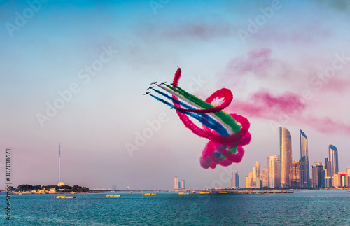 Fotografie Air show over Abu Dhabi skyline for the UAE national day celebration