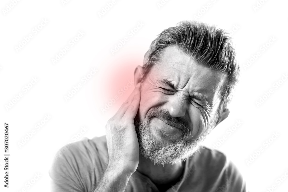 Man feels ear pain isolated. People, healthcare and medicine con Man feels ear pain isolated. People, healthcare and medicine con