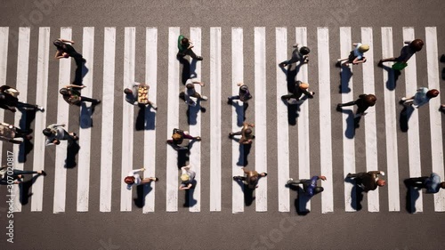 Large crowd of people cross the road at pedestrian crossing 4k photo