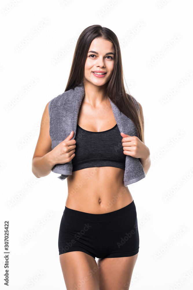 Sporty and attractive fitness woman with towel isolated on white background Sporty and attractive fitness woman with towel isolated on white background