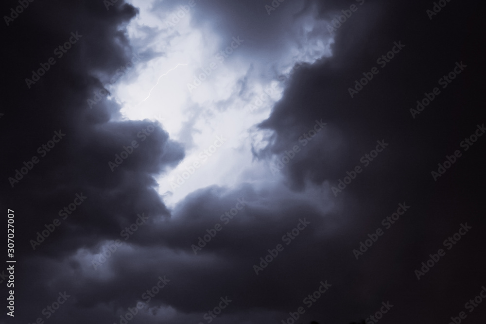 Bright lightning in the black sky over the city Bright lightning in the black sky over the city
