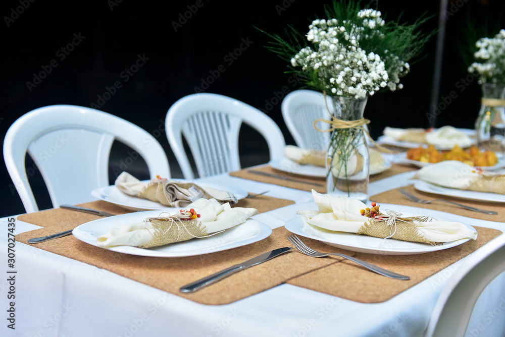 elegant table setting, natural flowers