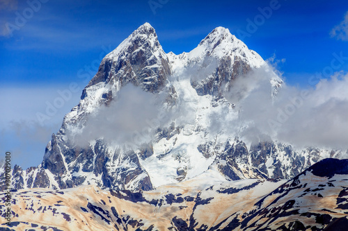 Ushba. Extreme peak. Svaneti beautiful mountains. Caucasian nature photo