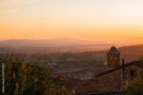 Beautiful sunset sky with evening haze over Umbria countryside seen from the city of Perugia