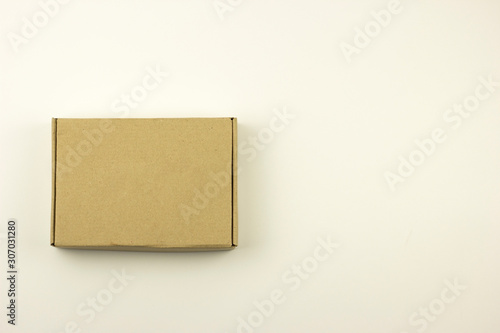 Cardboard box isolated on a white background © Olha