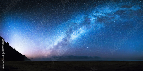 The Milky Way galaxy as seen from a remote Kalalau beach on the island Kauai of Hawaii.   photo