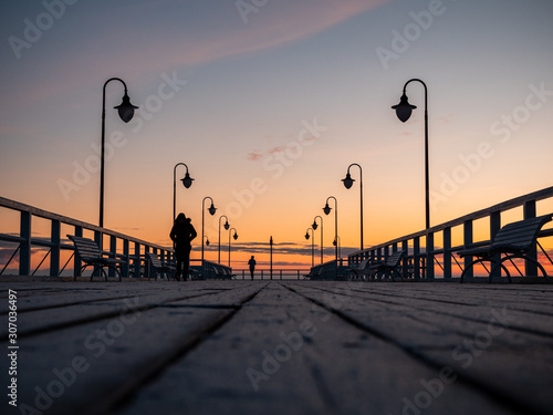 Fototapeta Naklejka Na Ścianę i Meble -  Frosted pier at sunrise