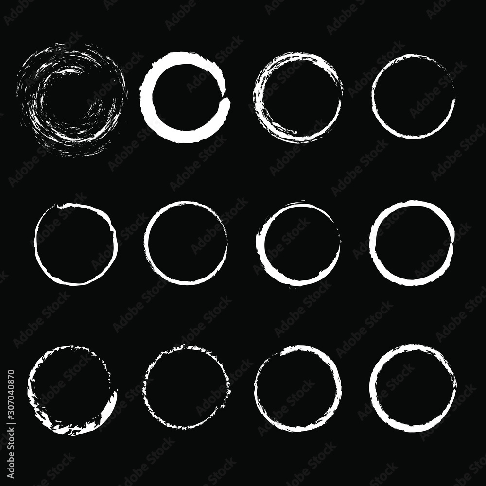Set of white abstract grunge circles on a black background. Geometric art. Monochrome shapes. Design element for frames, logo, sign, symbol, prints, web pages, template and textile pattern Set of white abstract grunge circles on a black background. Geometric art. Monochrome shapes. Design element for frames, logo, sign, symbol, prints, web pages, template and textile pattern