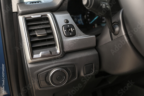 Air conditioner and lighting control buttons in modern car