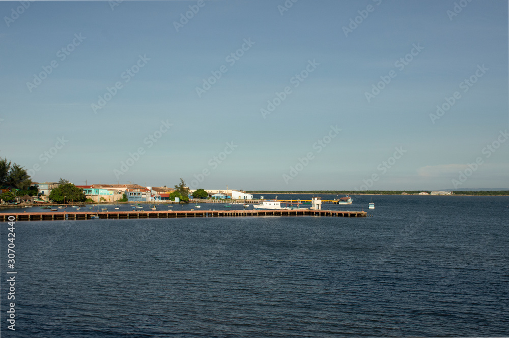 the harbor bridge where boats are anchored normally in Gibara Cuba
