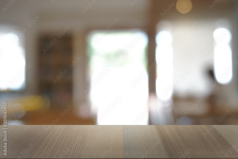 Empty dark wooden table in front of abstract blurred bokeh background of restaurant . can be used for display or montage your products.Mock up for space. Empty dark wooden table in front of abstract blurred bokeh background of restaurant . can be used for display or montage your products.Mock up for space.