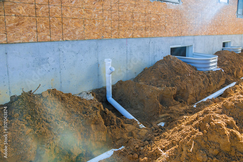 Foto Drainpipe in ground for waste of water around house