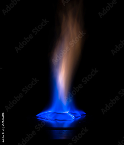 A fiery flame on a black background
