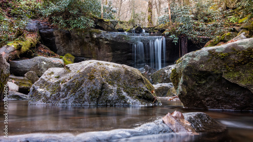 smoky mountains landscape in Gatlinburg, Tennessee. An autumn landscape with oak trees and a pond photo