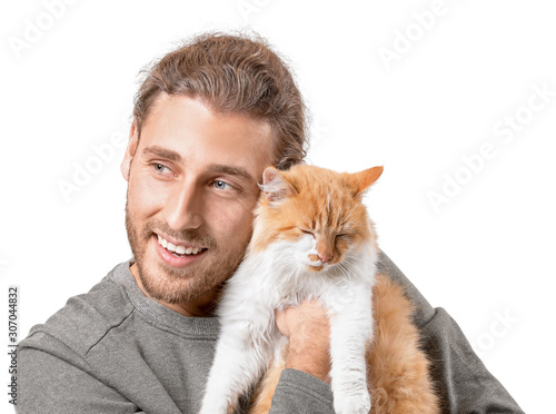 Man with cute cat on white ...