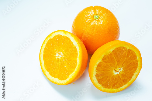 Fresh slice orange tropical fruit on white background