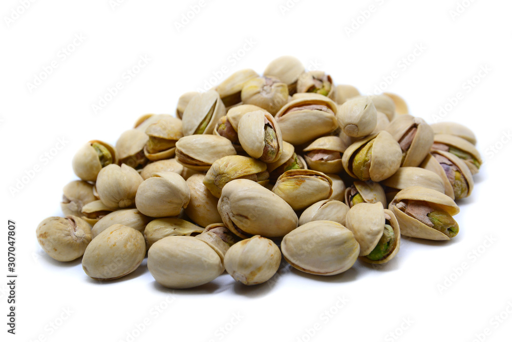 peanut pistachio resting on a isolated white background peanut pistachio resting on a isolated white background