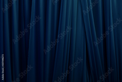 beautiful dark blue smooth cloth background vertical line, navy blue fabric layer background, nice volume texture of textile, background of modern pattern, cloth wall with space use for element