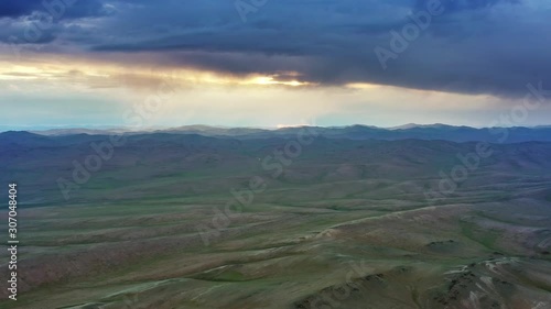 Aerial view of mountains landscape at sunset in Mongolia, 4k photo