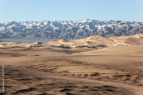 Gobi Desert Singing Sand Dunes mountain at background