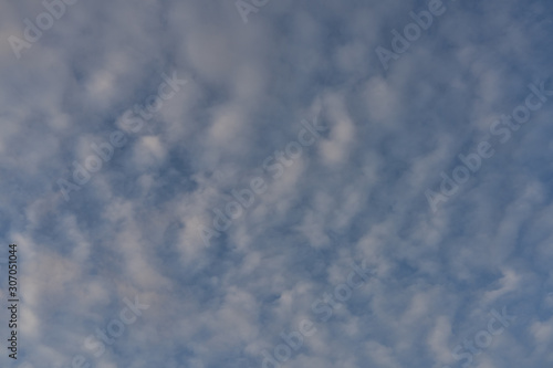 Cotton Clouds High In The Blue Sky © John