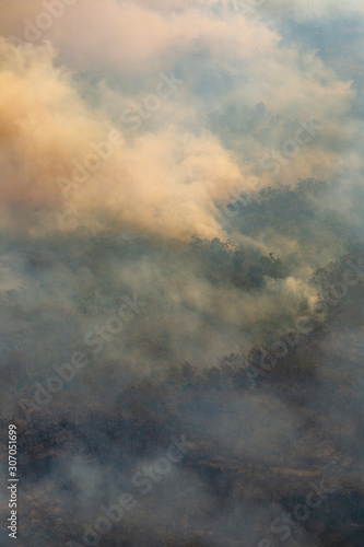 Burning bushland in Australia aerial image portrait orientation