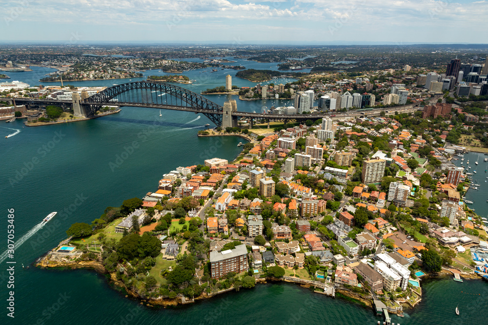 Fototapeta premium Sydney harbour bridge and Kirribilli suburb aerial shot on a sunny day