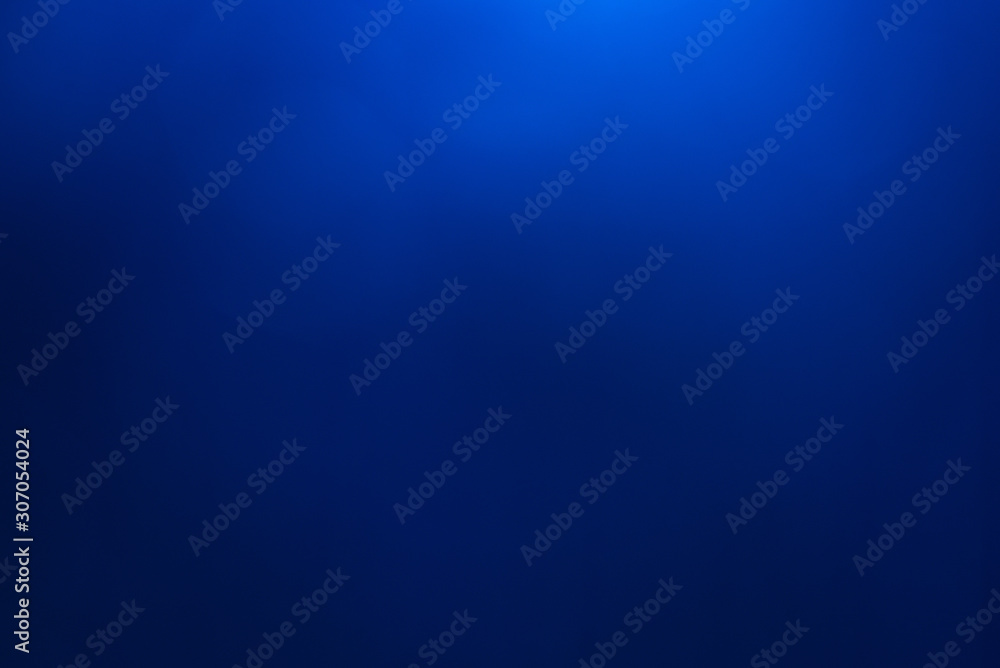 Blue light flare special effect,concert lighting against a dark background ilustration. lens flare Blue light flare special effect,concert lighting against a dark background ilustration. lens flare