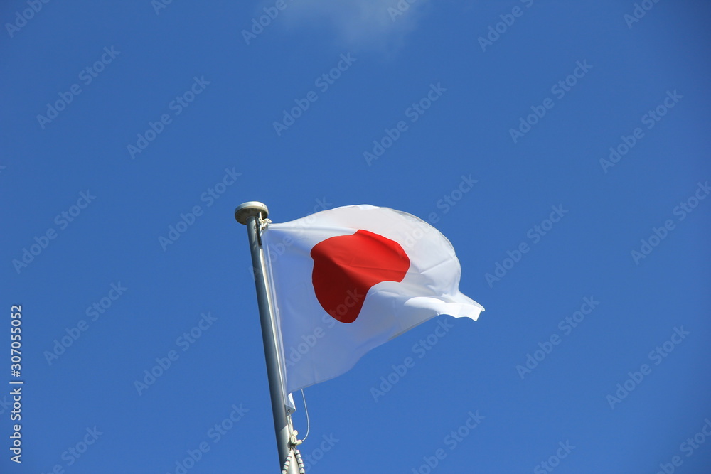 青空を背景にはためく日本の国旗 Stock Photo Adobe Stock
